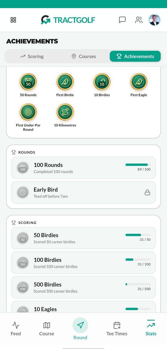 TractGolf achievements screen with earned trophies and progress bars towards 100 rounds and 50 birdies